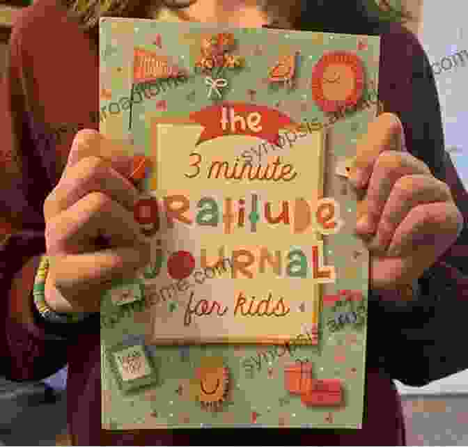 A Person Smiling And Holding A Gratitude Journal We Re All Freaking Out (and Why We Don T Need To): Finding Freedom From Your Anxious Thoughts And Feelings