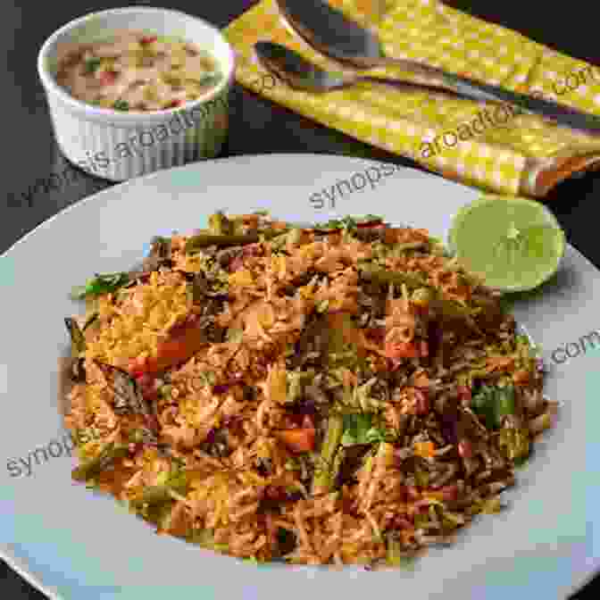 A Steaming Bowl Of Chicken And Vegetable Biryani, Adorned With Crispy Fried Onions And Fresh Coriander COOKING YUMMY RECIPES FOR RAMADAN: 9 Simple RAMADAN Recipes To Entertain Your Friends And Family This Season And Beyond